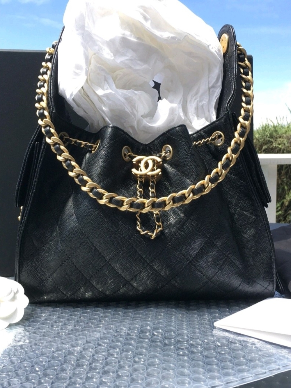 CHANEL Black Quilted Leather Drawstring Bucket Bag with Gold Chain